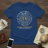 T-shirt featuring global currency symbols arranged around a globe with text "GLOBAL CURRENCIES EXCHANGE THE WORLD"