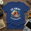 Go Away I'm Introverting t-shirt with a cartoon hermit crab wearing headphones and working on a laptop inside its shell