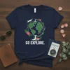 Navy t-shirt with "GO EXPLORE." text, globe graphic, airplane, and pink flowers