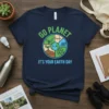 Go Planet It's Your Earth Day t-shirt with a cute smiling Earth graphic, wind turbines, solar panel, and recycling symbols