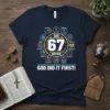 Navy t-shirt with "SIX 67 SEVEN GOD DID IT FIRST!" text and circular bible verse graphics, religious design