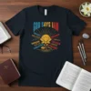Navy t-shirt with "God Says I Am" design, featuring a lotus flower and biblical affirmations like Unique, Chosen, Forgiven, Strong