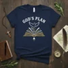 Navy t-shirt with "GOD'S PLAN" text, a white dove, and an open book graphic, representing Christian faith