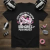 Graphic t-shirt with white text "GOOD GIRLS GO TO HEAVEN BAD GIRLS PLAY HOCKEY" and image of a female hockey