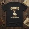 GOOSE WILD WEST WANDERER text with a cartoon goose wearing a cowboy hat and boots on a black t-shirt