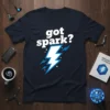 Dark t-shirt with white text "got spark?" and a blue and white lightning bolt graphic