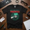 Black t-shirt with "got a new error... PROGRESS!" text and a robotic thumb giving a thumbs-up with circuit board graphics