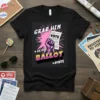 Grab Him By The Ballot Vote graphic t-shirt featuring a fist holding a ballot with the text "Grab Him By