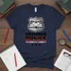 Grammar Police To Serve & Correct t-shirt design featuring a shield emblem with an open book and glasses, bold text