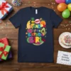 Grandpa of the Birthday Girl text with cute fruit graphics like banana, pineapple, and avocado on a navy t-shirt