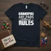 Grandpas Are Dads Without Rules quote on a navy blue t-shirt, featuring bold white typography