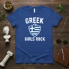 Blue t-shirt with white text "GREEK GIRLS ROCK" and a Greek flag shield graphic