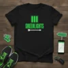Black t-shirt with "Greenlights" text and a forward-pointing arrow graphic, symbolizing positive momentum