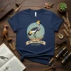 Grey Crowned Crane marceraphian text on a navy t-shirt with a graphic of the bird in its nest