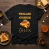 Black t-shirt with "Grilled Cheese Queen" text and a graphic of a melting cheese sandwich wearing a crown