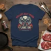 Griller's Best Friend Flame On Sizzling Hot text with crossed spatulas and chef hat graphic on a navy t-shirt
