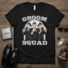 Black t-shirt with "Groom Squad" text and three cartoon men in suits holding champagne glasses