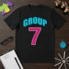 Black t-shirt with "GROUP" in aqua blue and "7" in magenta, representing the Group 7 team number