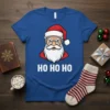 Grumpy Santa Claus face with "HO HO HO" text on a blue t-shirt, festive Christmas design