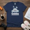 Navy blue t-shirt featuring the text "Gubby" under a grumpy cartoon bunny cloud graphic