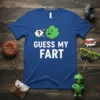Blue t-shirt with white text "GUESS MY FART" and a cartoon green gas cloud with a question mark