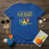 Blue t-shirt with "GUESS WHAT? TEES/TOTES BEACH HORACE" text and a cartoon octopus holding shopping bags