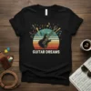 Guitar Dreams t-shirt design with an electric guitar, musical notes, and a retro sunset background