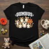 GUMBUS text above a group of cute cartoon cats wearing accessories, on a black t-shirt