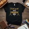 Black t-shirt with gold and white text "Hail yeah I'm a French Girl" and two Eiffel Tower graphics