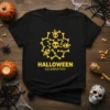 Black t-shirt with yellow "HALLOWEEN CELEBRATION" text and a circular skull and bone graphic
