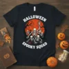 Halloween Spooky Squad t-shirt design featuring a group of skeletons against a large orange moon and spooky trees