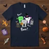 Halloween Tooth Boo! T-Shirt featuring cute cartoon teeth dressed as a mummy, witch, and ghost, with candy and RIP tombstone