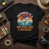 Happiness Is A Big Fish And A Witness quote on a black t-shirt with a bass jumping at sunset graphic