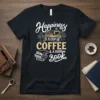 Happiness Is A Cup Of Coffee & A Good Book quote on a black t-shirt, featuring a coffee cup and