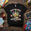 Happy 100 Sweet Days of School t-shirt with candy schoolhouse and lollipops graphic