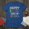 Happy 100th Day of School text in colorful, chalk-style font on a blue t-shirt, surrounded by school supplies