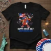 Happy 4th of July Independence Day t-shirt with a cartoon hot dog holding an American flag and wearing sunglasses, surrounded