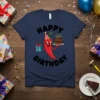 Happy Birthday Chili T-Shirt featuring a cartoon chili pepper wearing a party hat, holding a birthday cake and a gift
