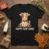 Happy Cow Farm text on a black t-shirt with a cute cartoon cow sitting below