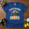 Happy Easter text above a cartoon monster truck with Easter eggs in the grass, on a blue t-shirt