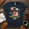 Happy Go Lucky Snail T-Shirt with steampunk snail and hot air balloon graphic in white and yellow text