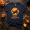 Happy Halloween text with a black cat and full moon graphic on a navy blue t-shirt, perfect for Halloween enthusiasts