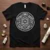 Black t-shirt featuring a white ornate turtle with a compass design, with text "Happy is Yairko LET'S" on the sides