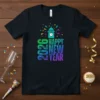 Happy New Year 2026 text with a clock tower graphic and confetti, on a black t-shirt