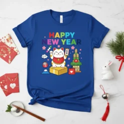 Happy New Year text with a cute Maneki Neko cat and Japanese New Year decorations on a blue t-shirt