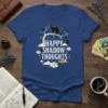 Happy Shadow Thoughts t-shirt with a black cat sitting on a tree branch, surrounded by clouds and moon phases, with