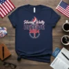 Navy blue t-shirt with "Harris Waltz BELIEVE 2024" text and a torch graphic, designed for political campaign support