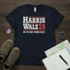Navy blue t-shirt with "Harris Walz '24 We're Not Going Back" text in white and red, political campaign slogan