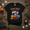 Black t-shirt with "Haunt Mess Express" text and a cartoon ghost train graphic, featuring ghosts and smoke