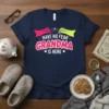 Navy blue t-shirt with the text "HAVE NO FEAR GRANDMA IS HERE" in bold pink and white letters, framed by